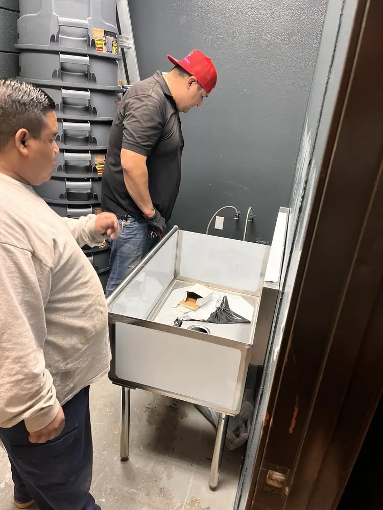 Commercial plumbing and sink installation in Laurel